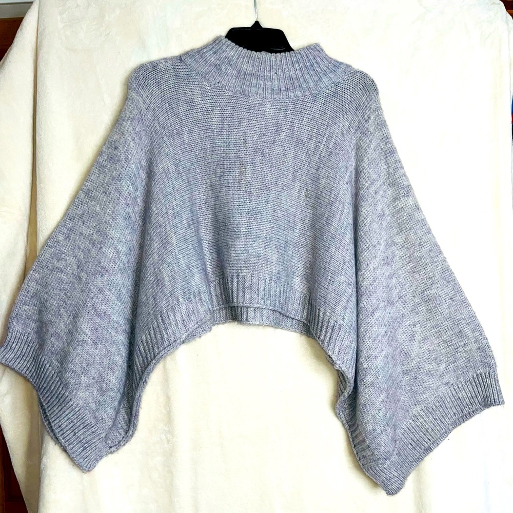 Gray Medium size sweater. Semi turtle neck, baggy sleeves perfect for fall.